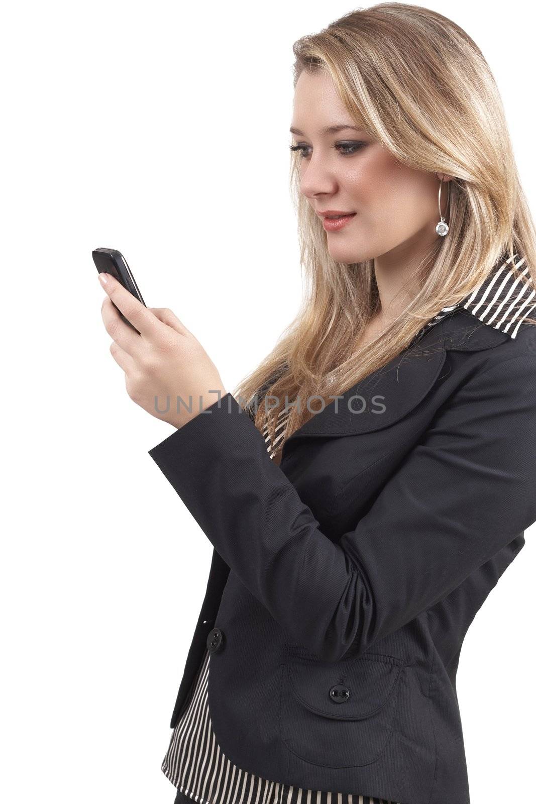 Beautiful blonde businesswoman wearing office clothes using her cellphone. Isolated on white background 