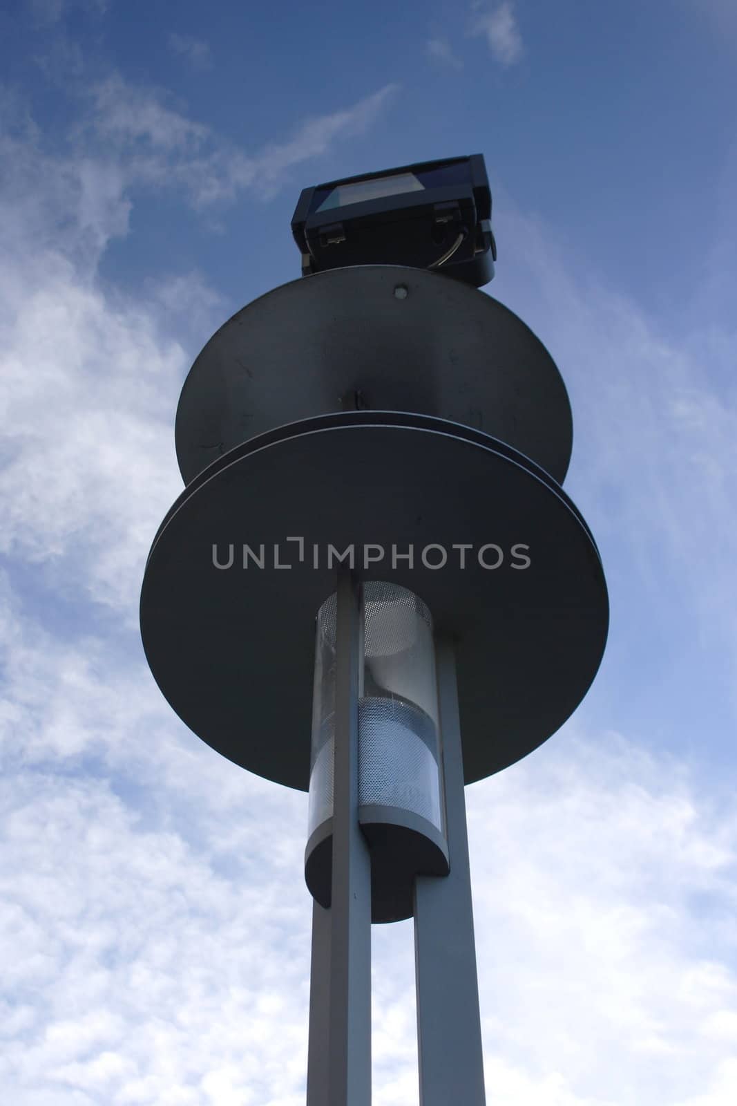 Street lamp against the blue sky 