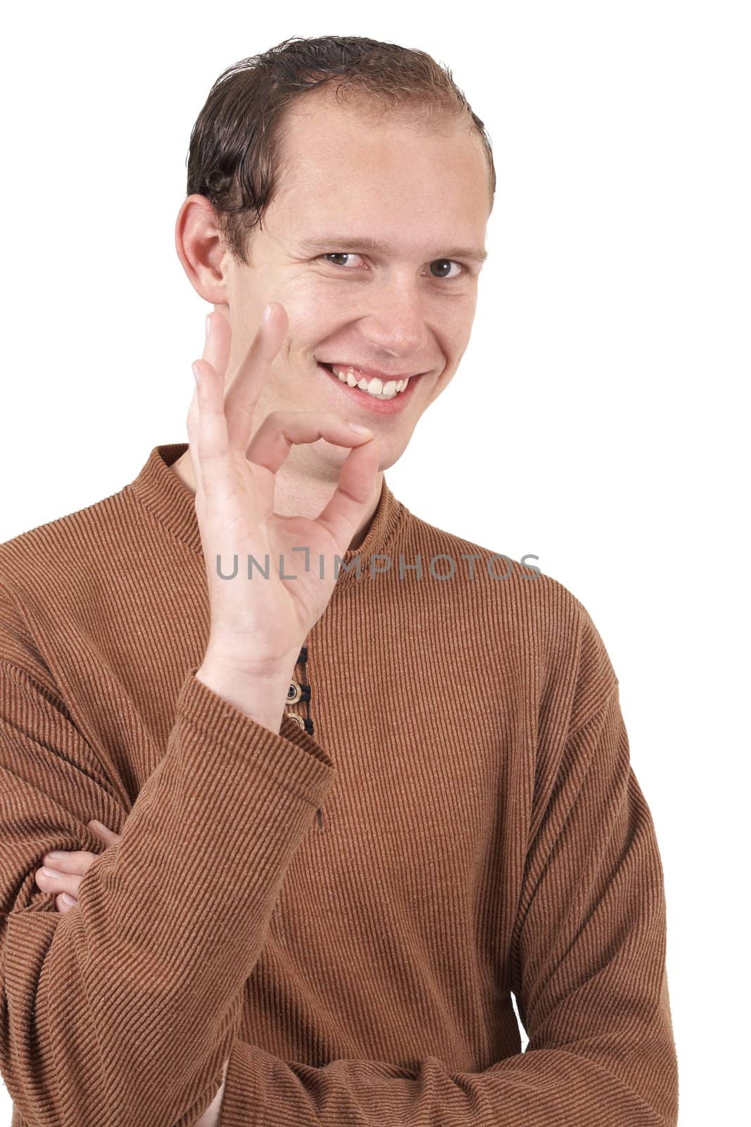 Young caucasian man wearing trendy clothes showing an ok sign with his hand. Isolated on white background