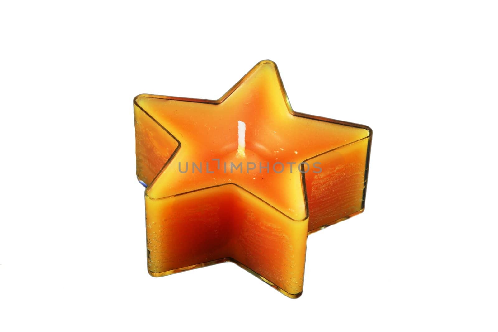 Candle in form of star on white backround 