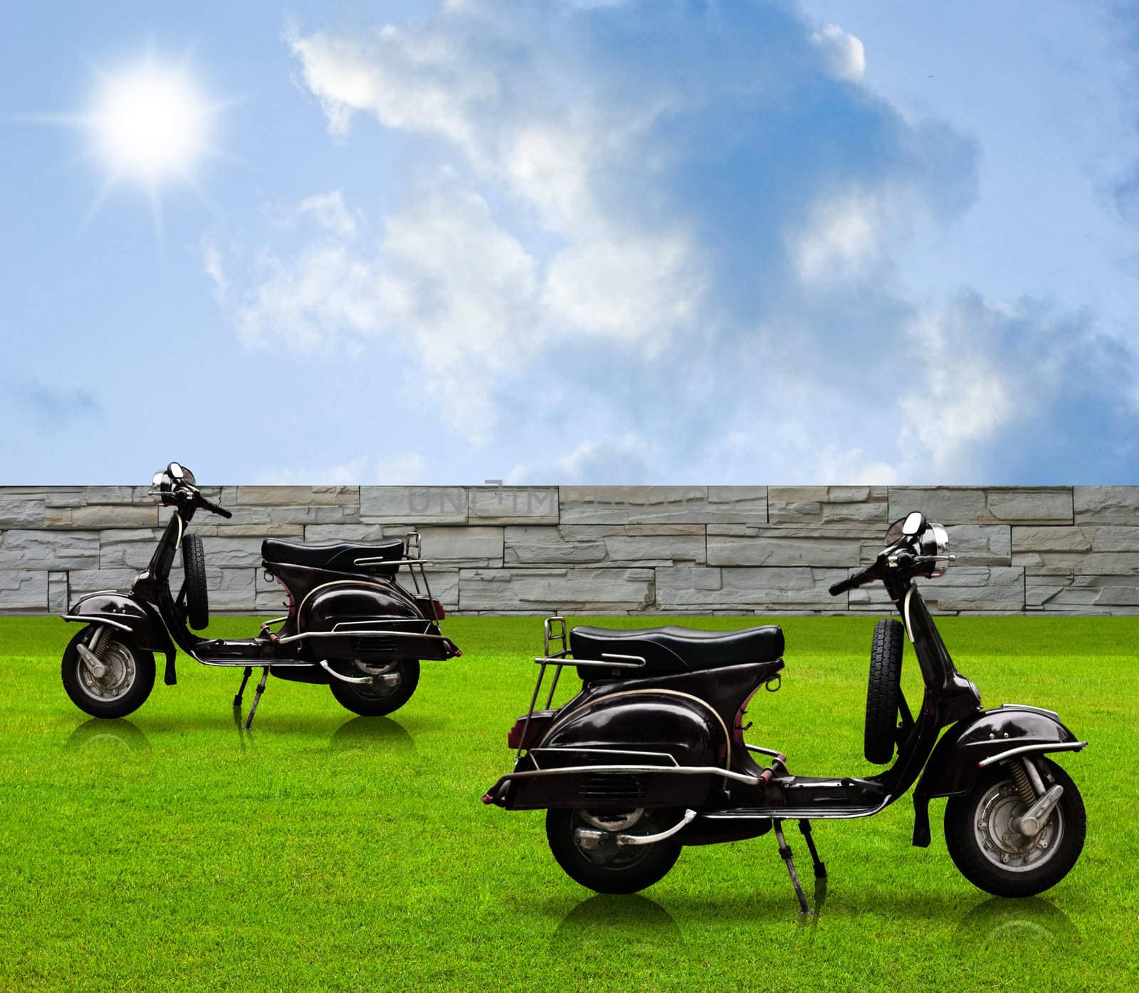 Black vintage motorbike in the garden with nicesky