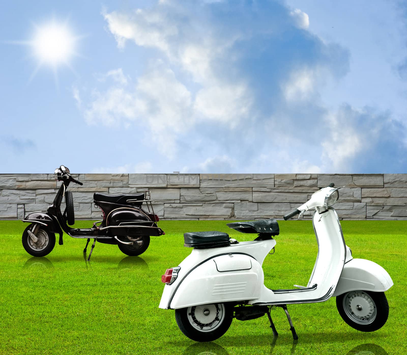 White and black vintage motorbike in the garden by pixbox77