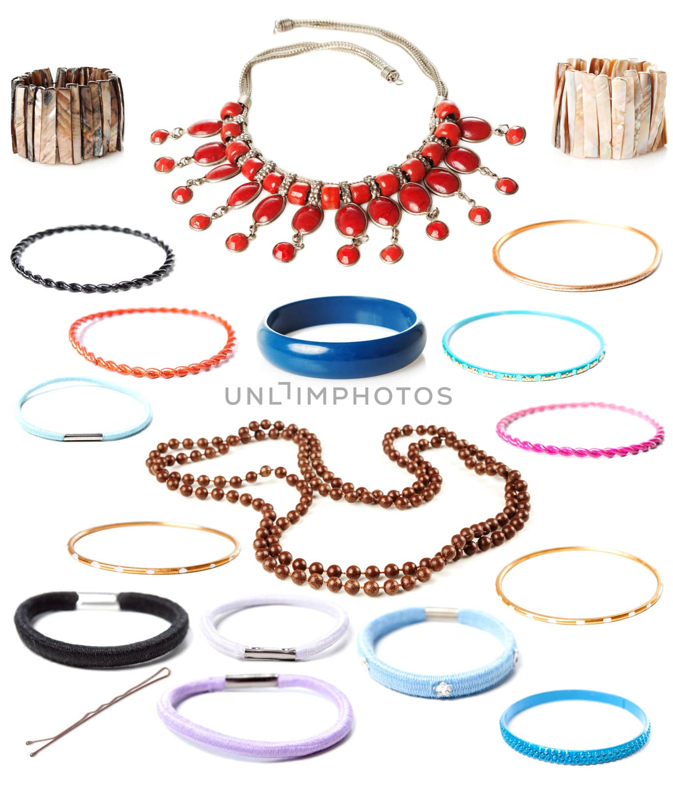 Accessories: necklace, bracelet, hairpin and elastic band isolated over white background