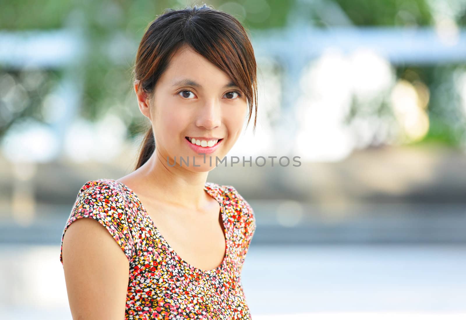 young woman smiling friendly