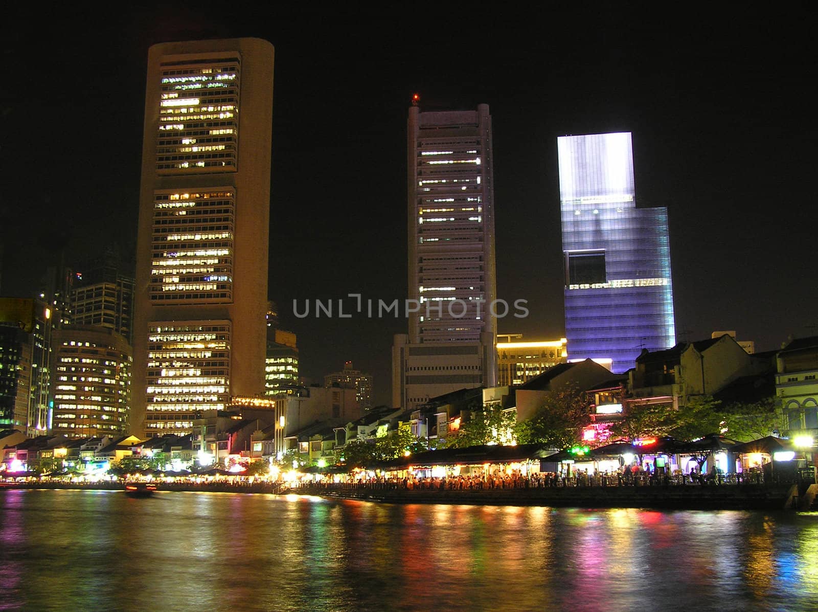 Pulsating night life of the town Singapore.