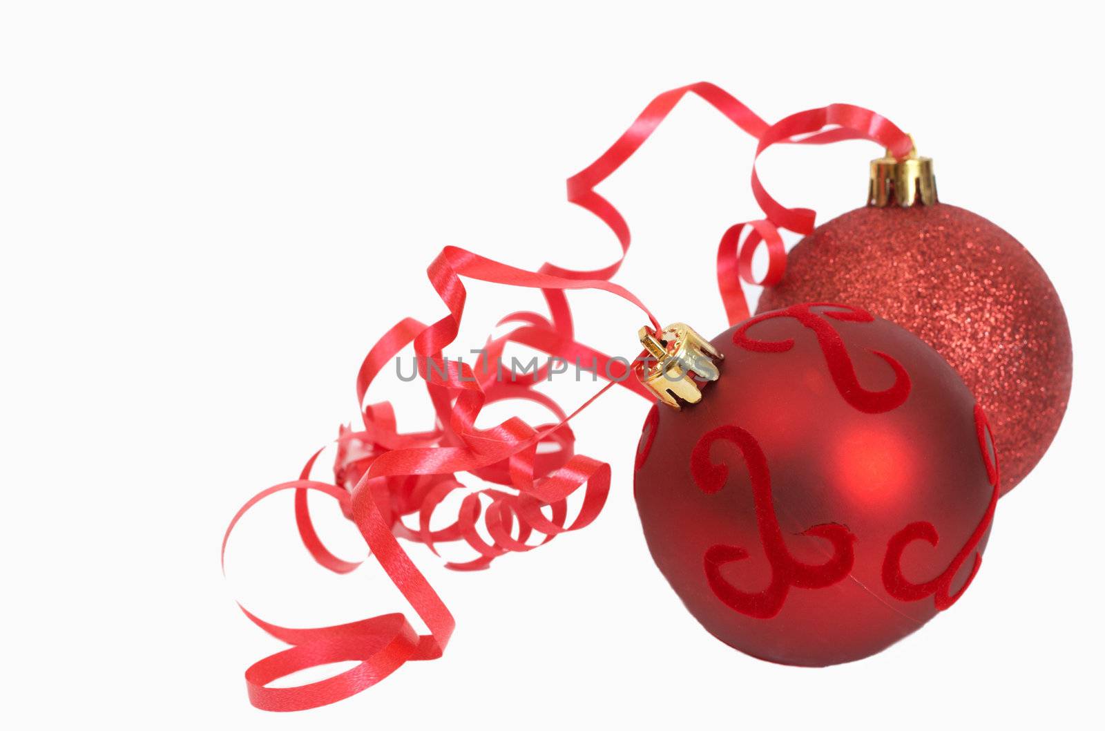 Two red Christmas baubles isolated on white background with copy space. 