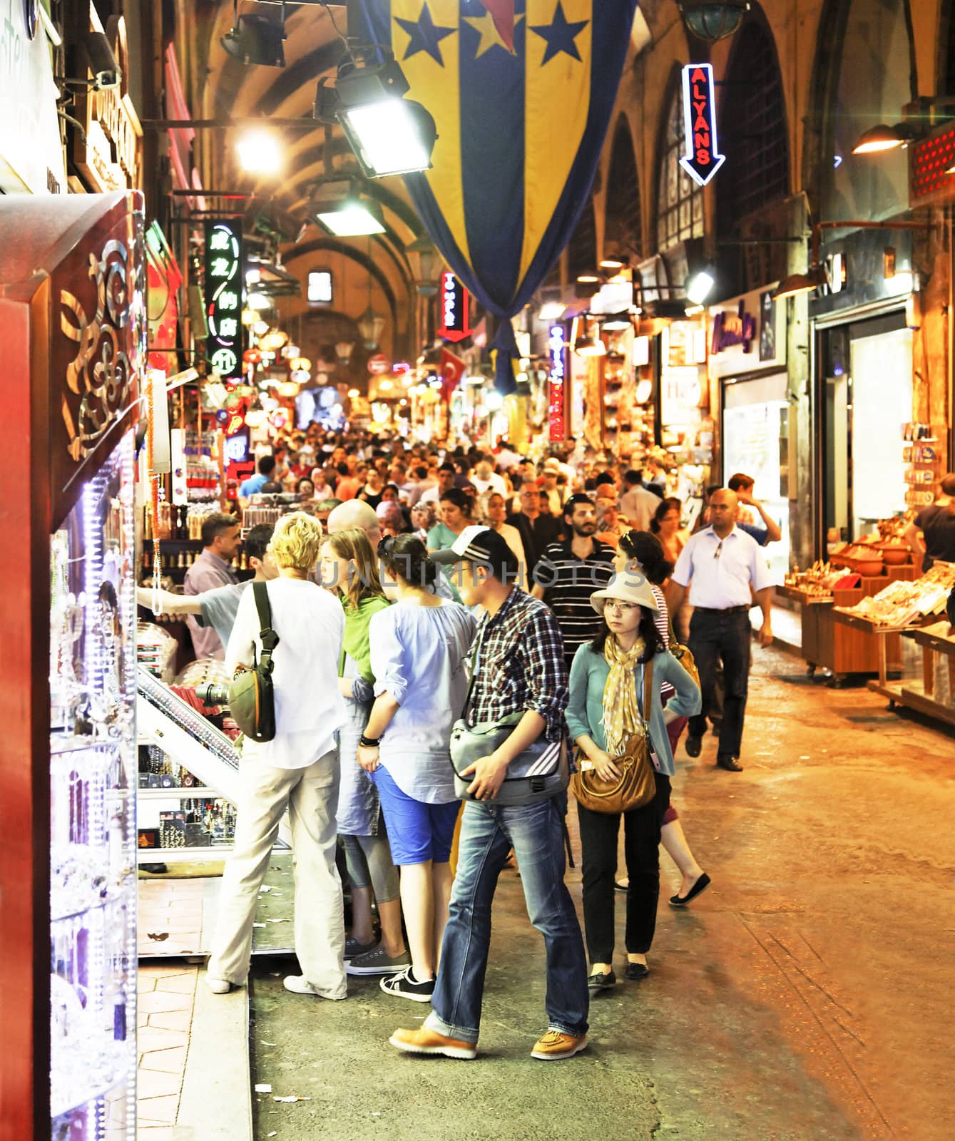 June 2011 Aisle scene in the Grand Bazaar Istanbul Turkey with shoppers at stalls