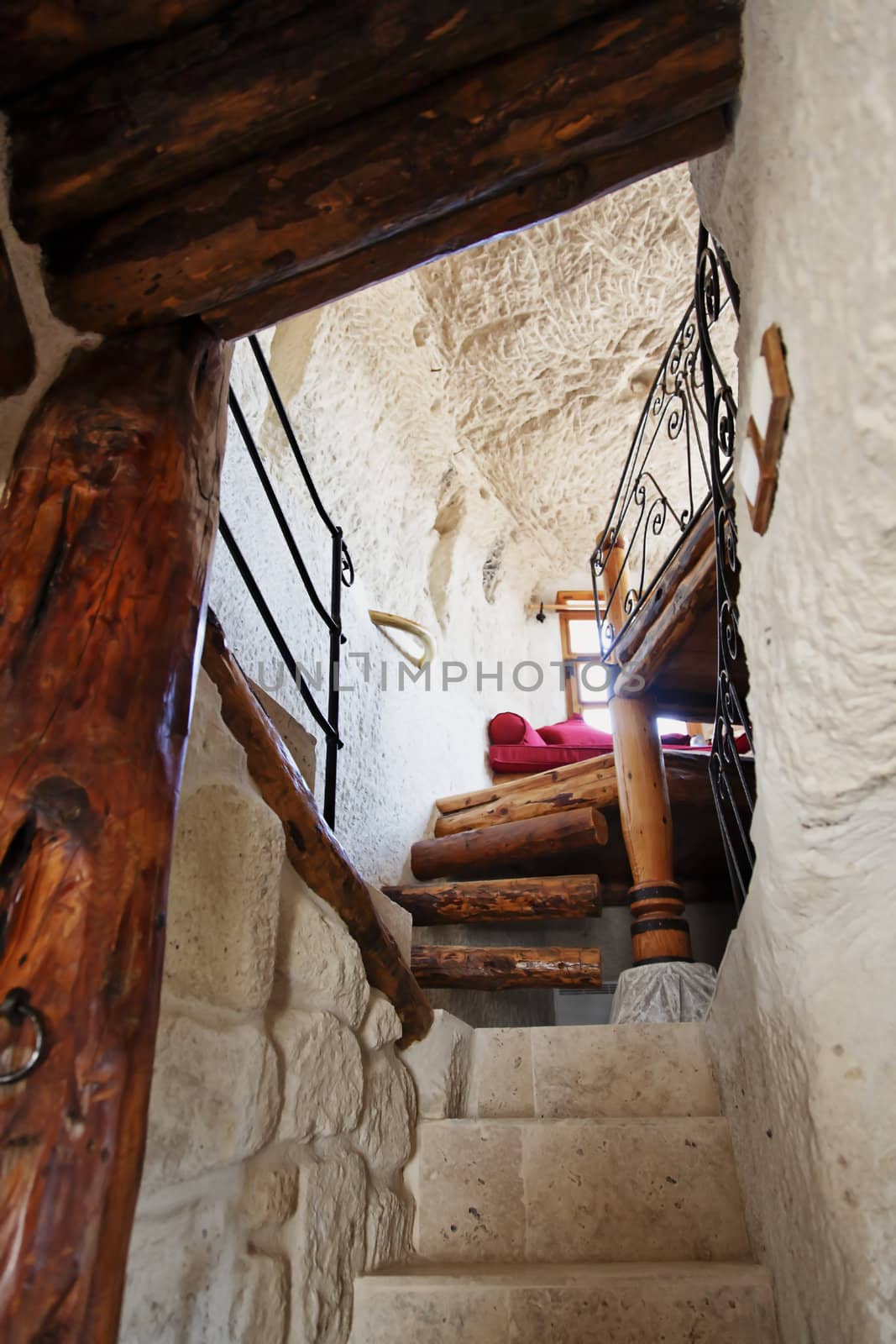 Stairwell in a Gerome cave leading a bedroom. Manmade Koza Cave, Turkey