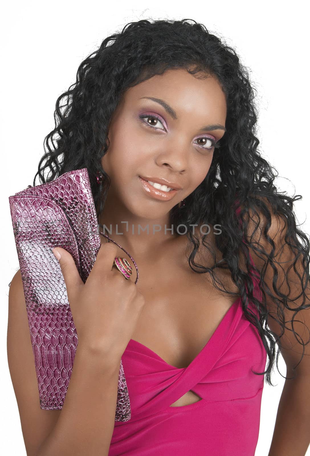 Beautiful brunette woman wearing pink cocktail dress smiling on white background