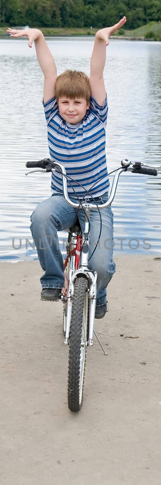 Boy on a bicycle by stepanov