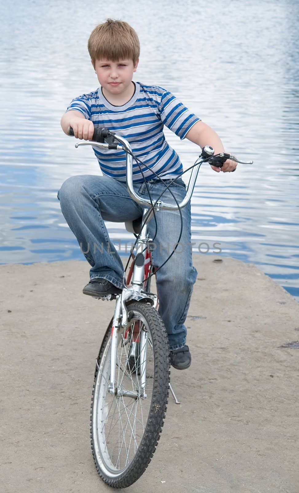 Boy on a bicycle by stepanov