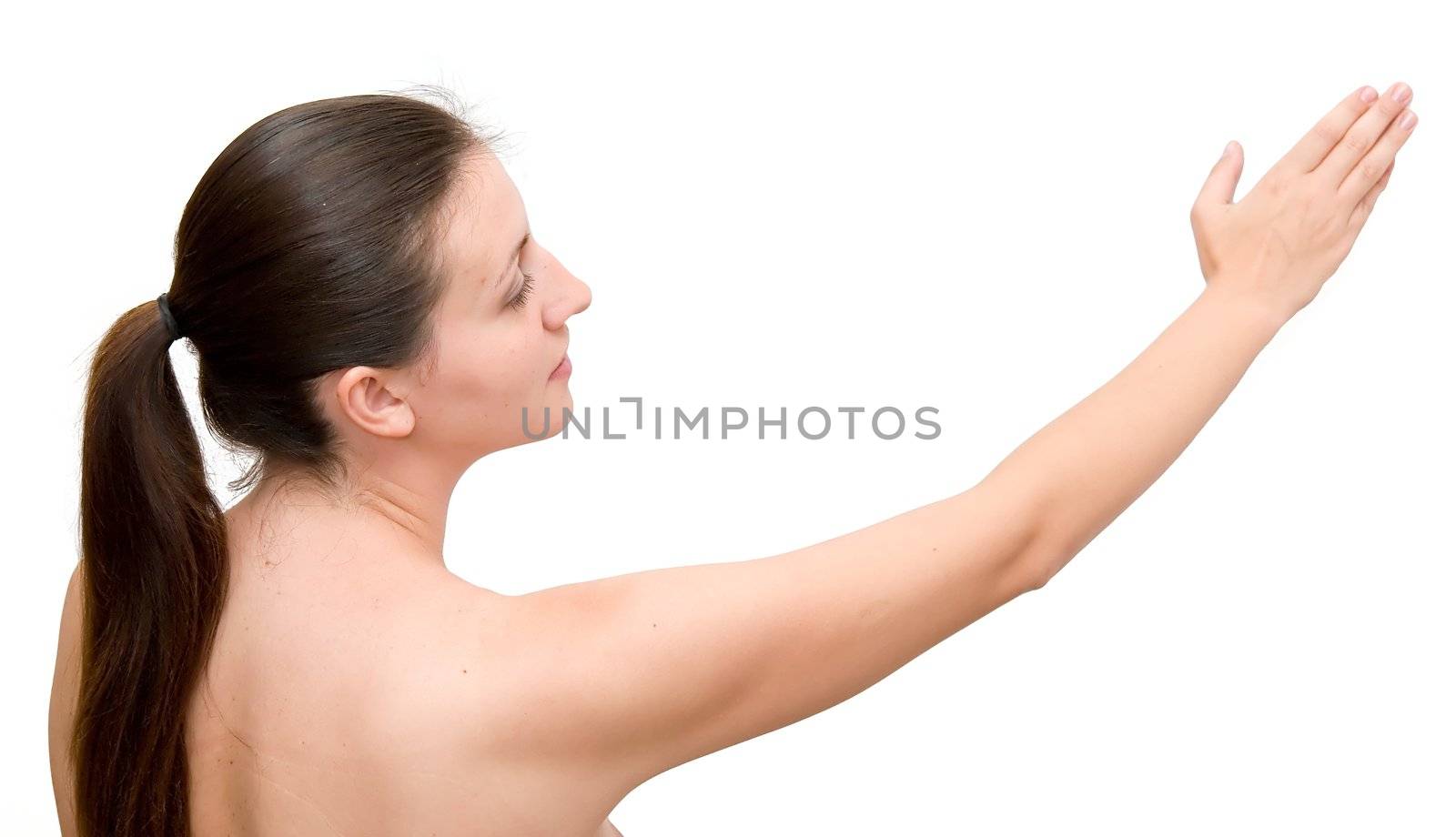 The young woman has stretched a hand on a white background