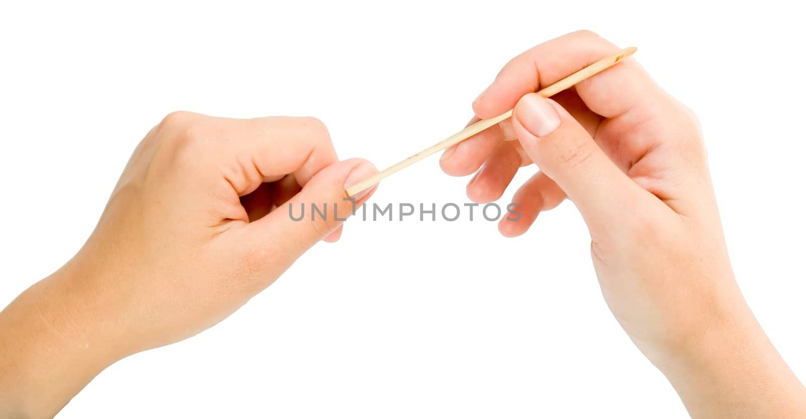 Closeup. Female hands make manicure.