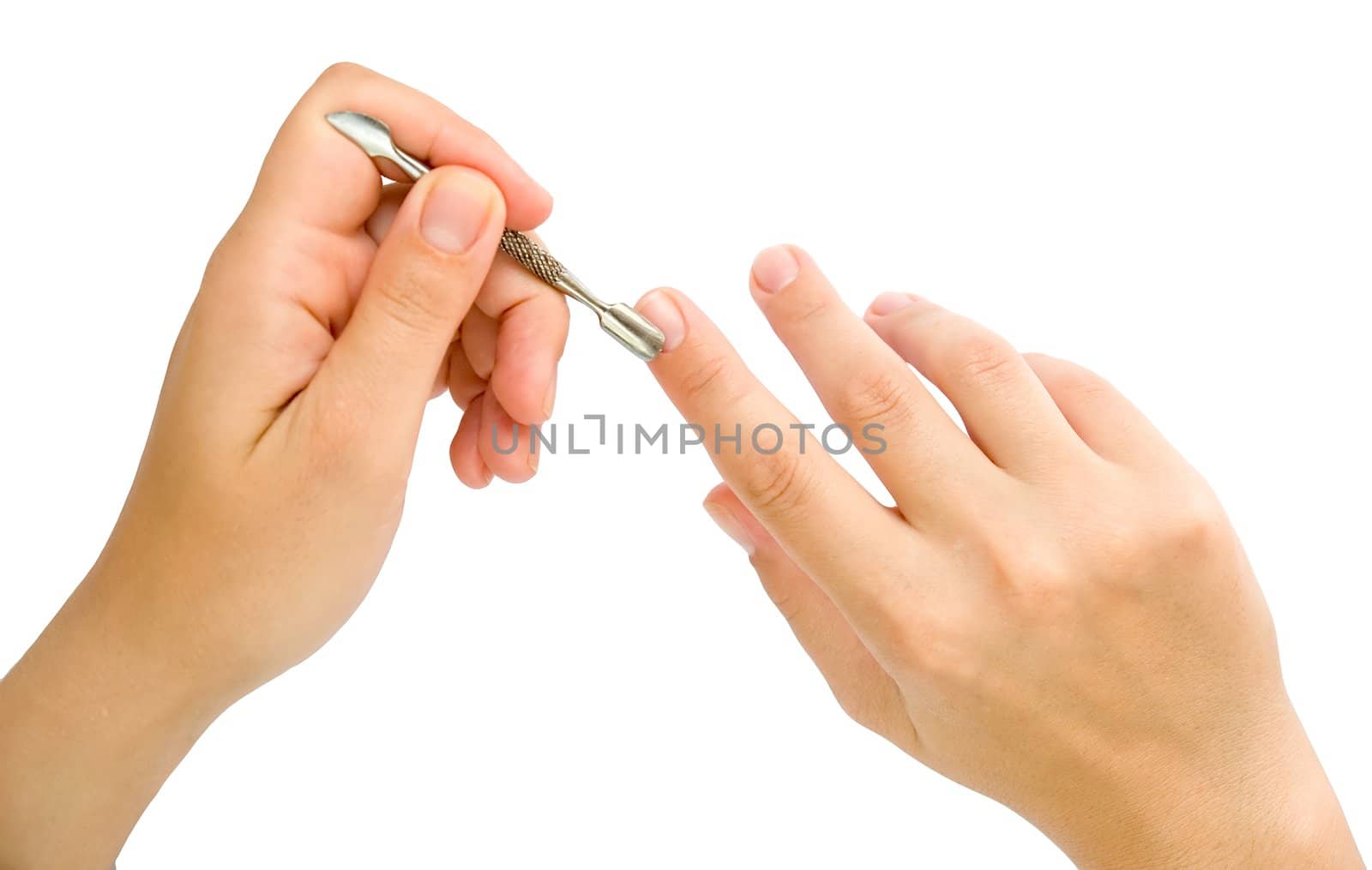 Closeup. Female hands make manicure.