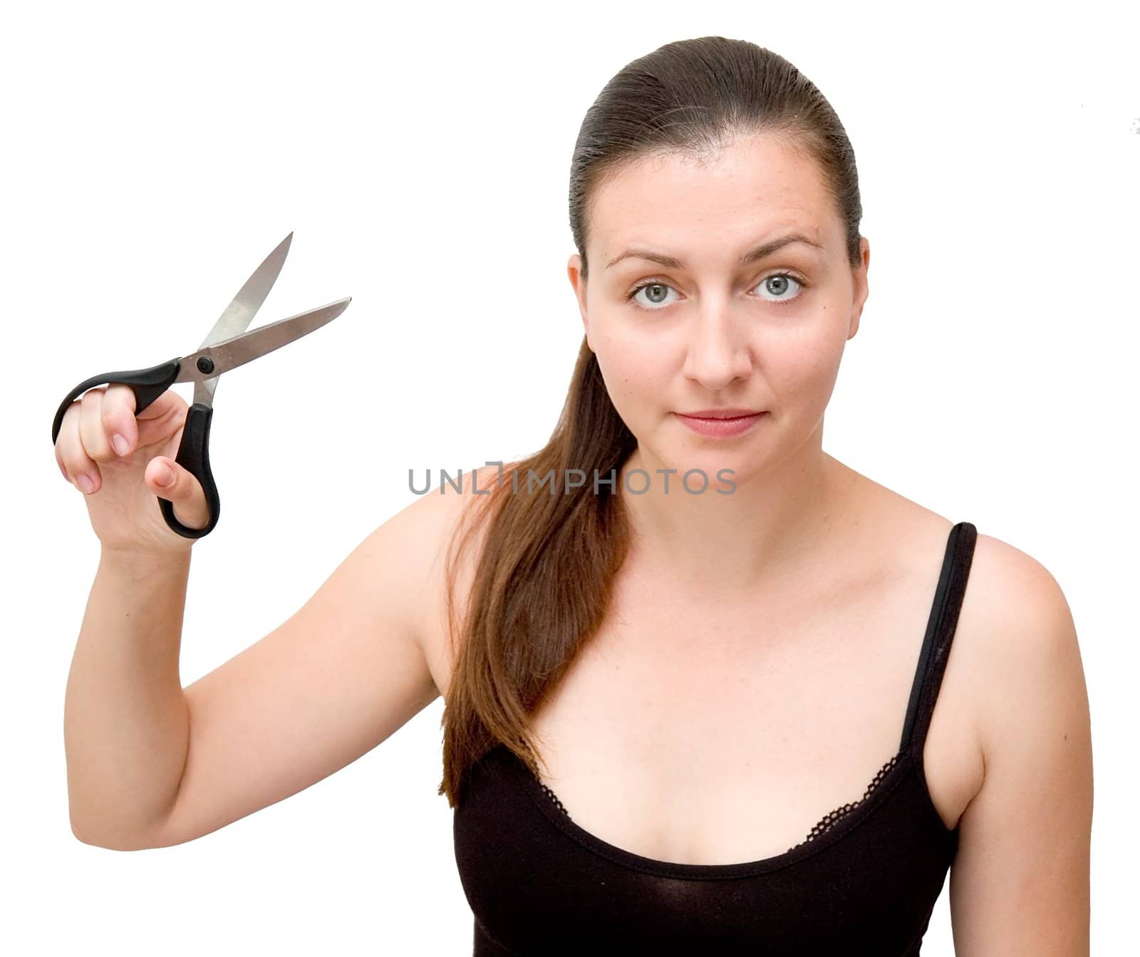 The young woman with scissors on a white background