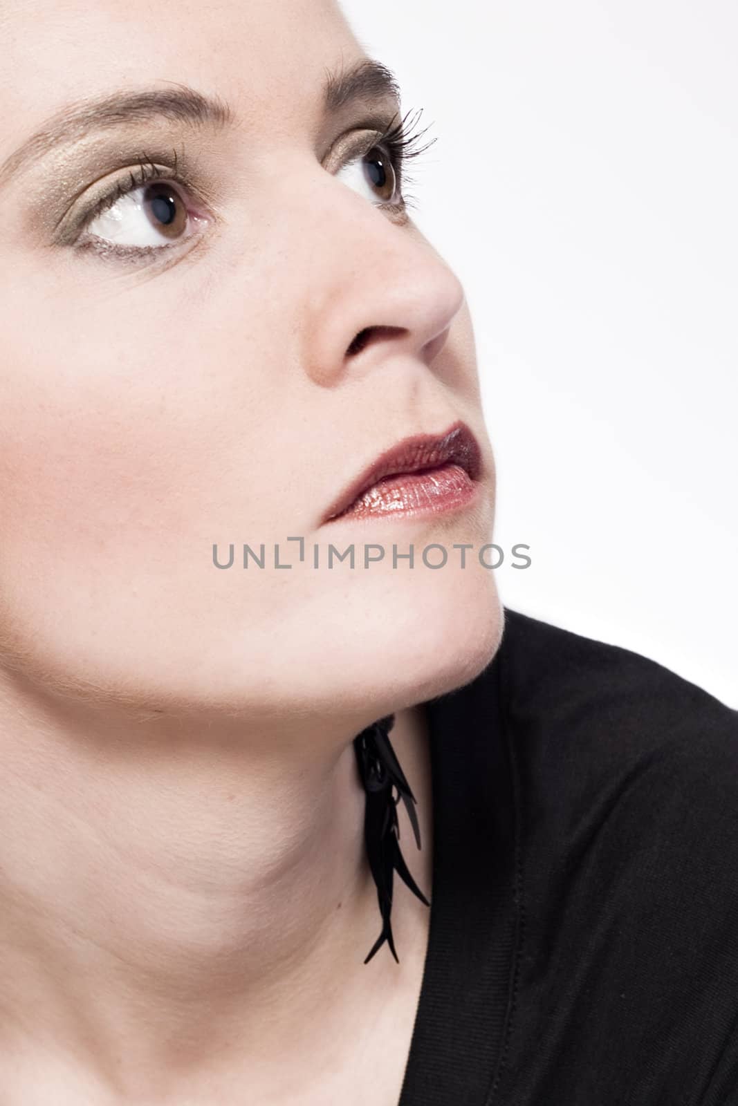 Studio portrait of a young woman looking relaxed