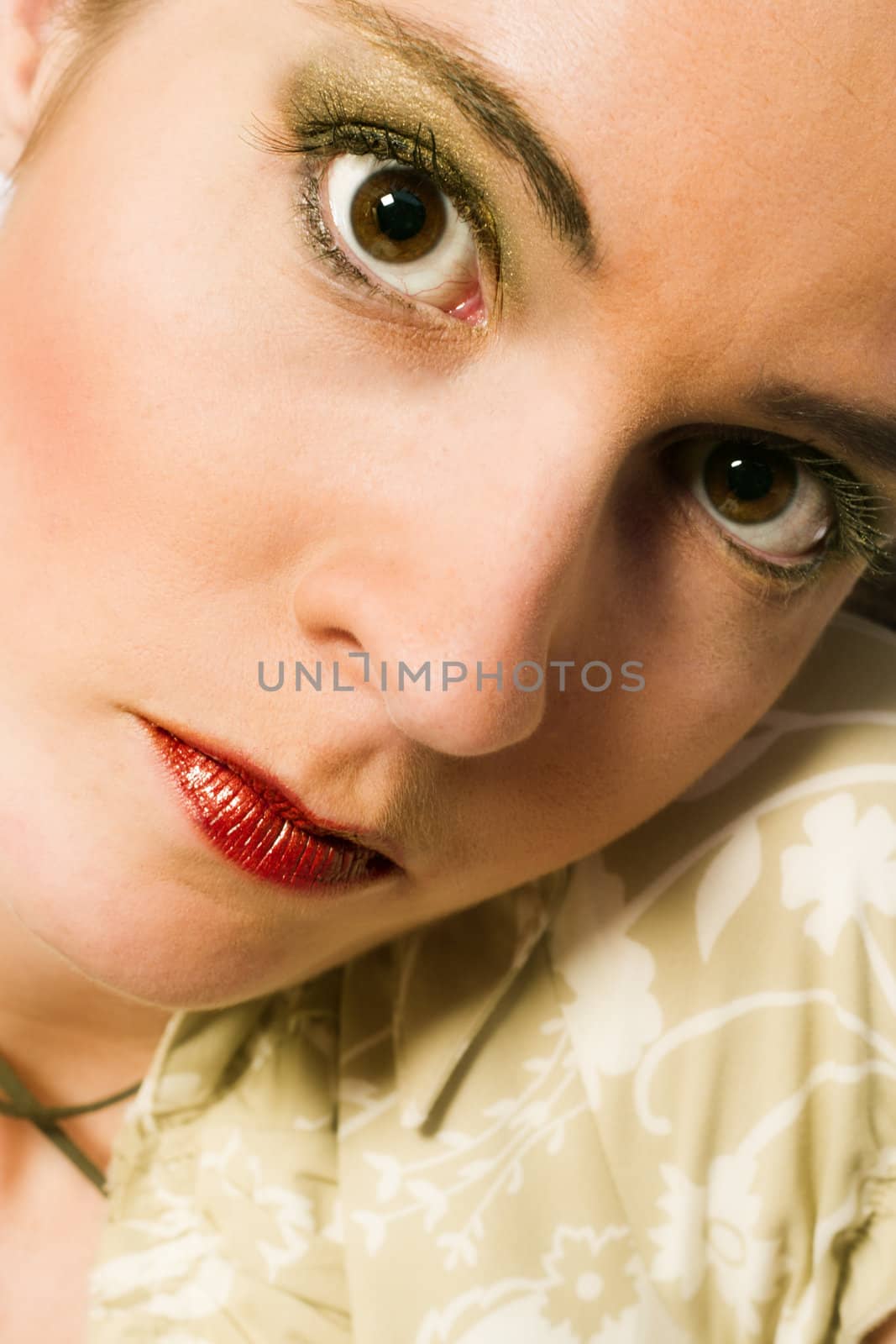 Studio portrait of a young woman looking concentrated