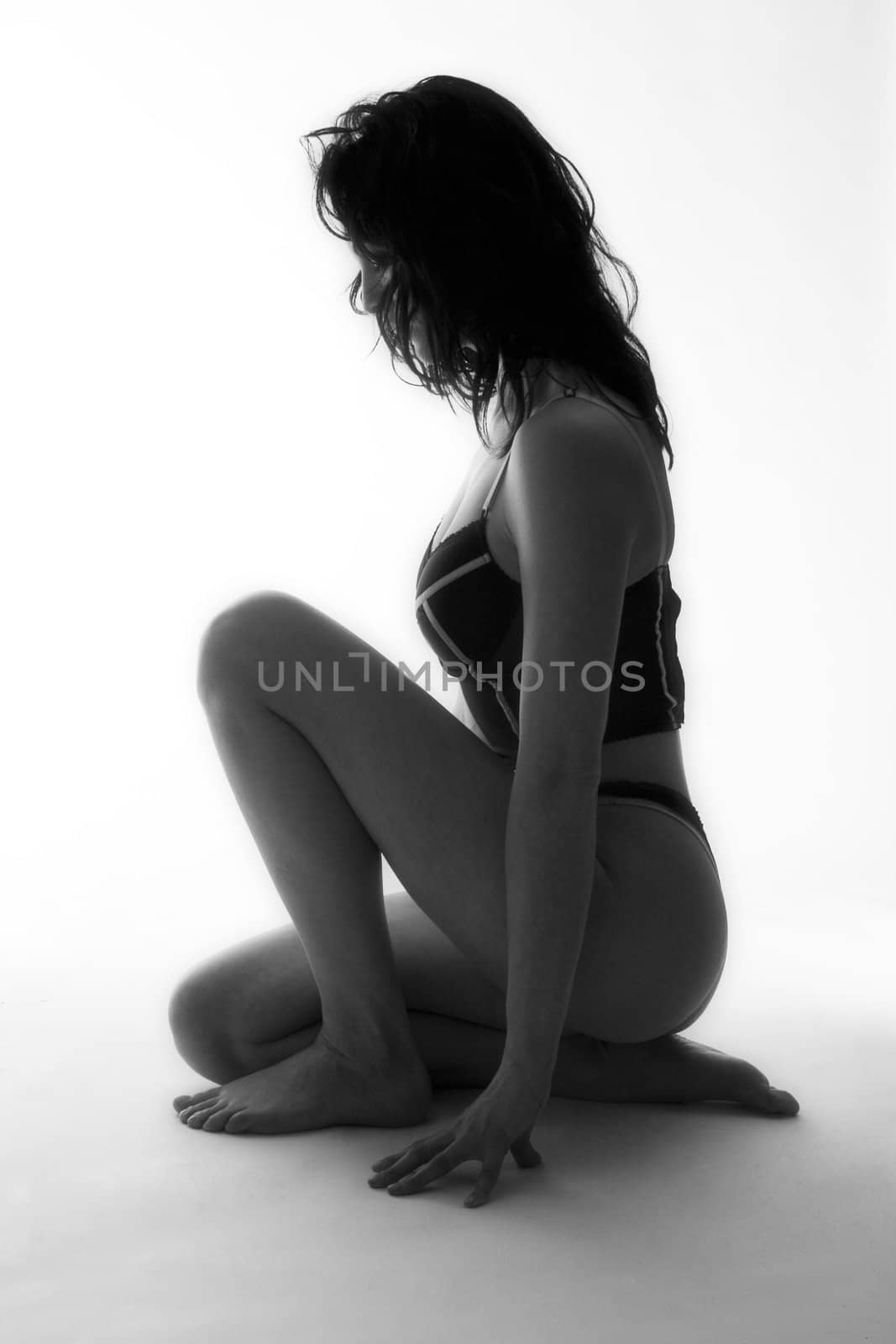 Studio portrait of a long haired beautifull woman in lingerie