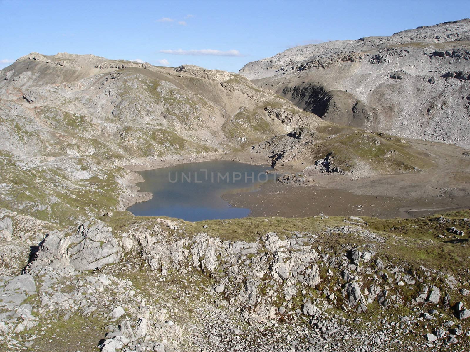 The Starkly Beautiful Lais Da Rims A Karst Lake In The Engadine Alps Canton Of Graubunden Switzerland.