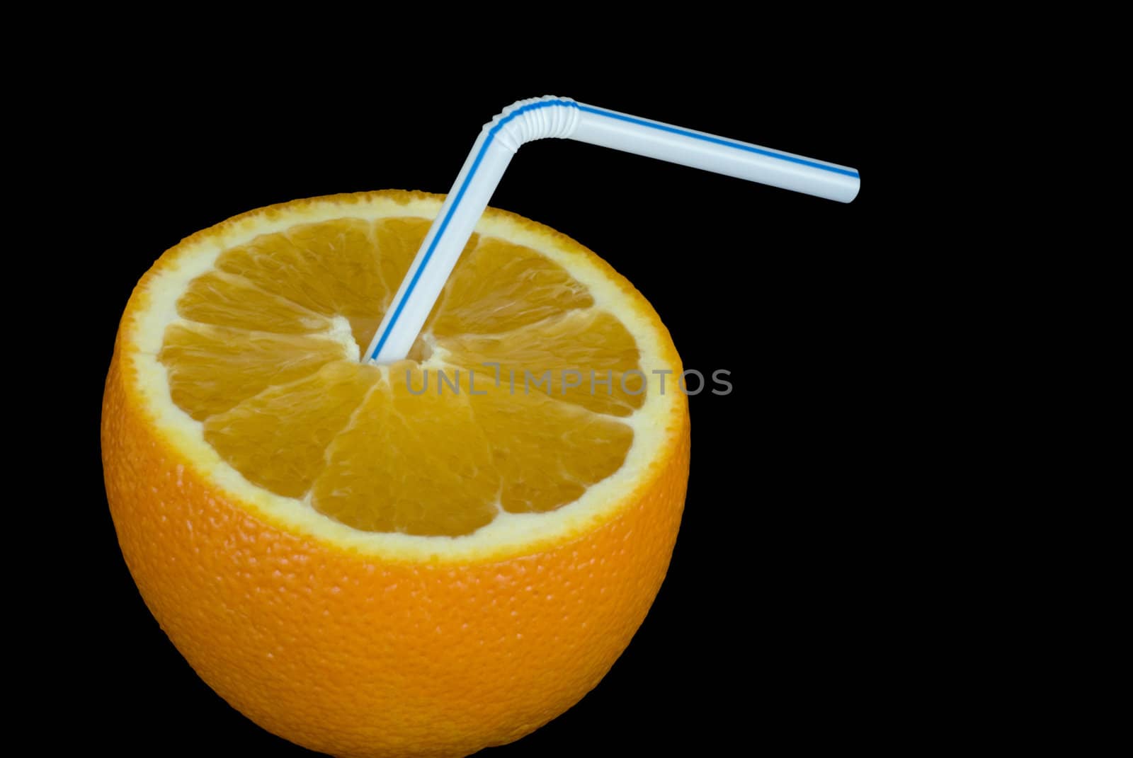 a ripe orange and a drinking straw