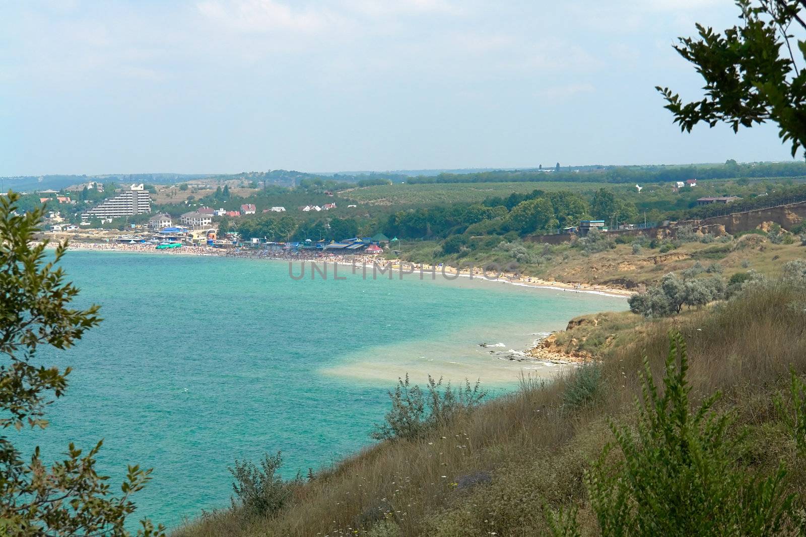 The Black Sea gulf on a background of the blue sky                               