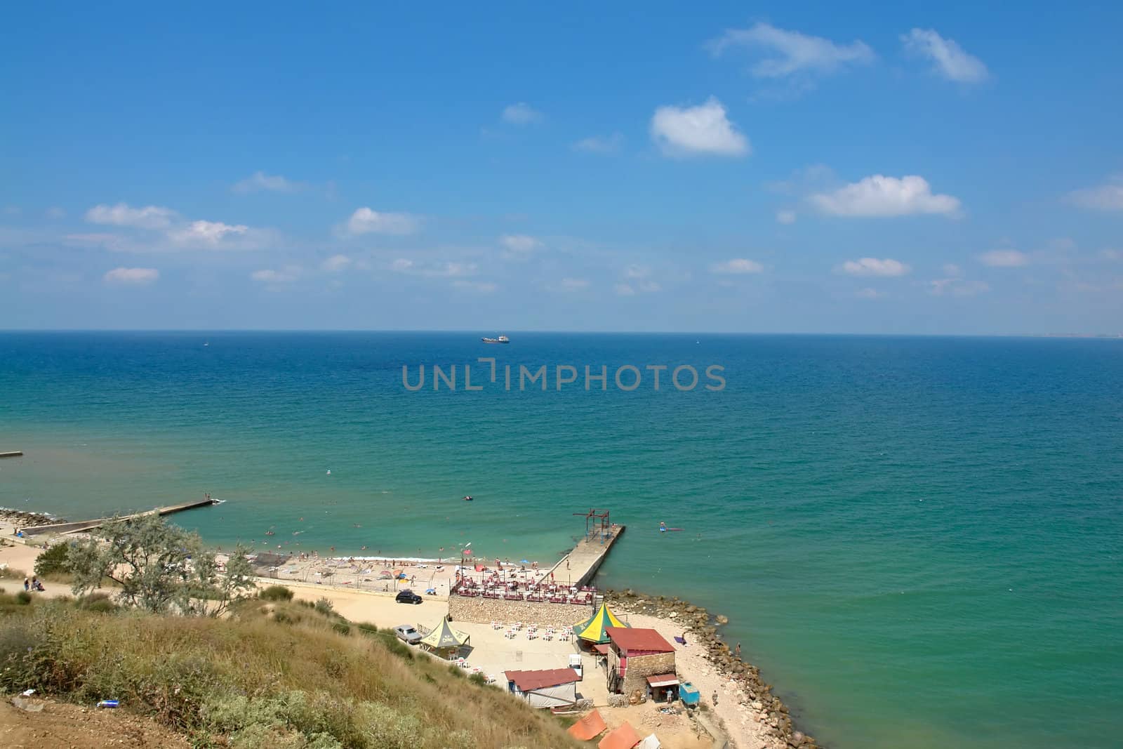 The Black Sea gulf on a background of the blue sky                               