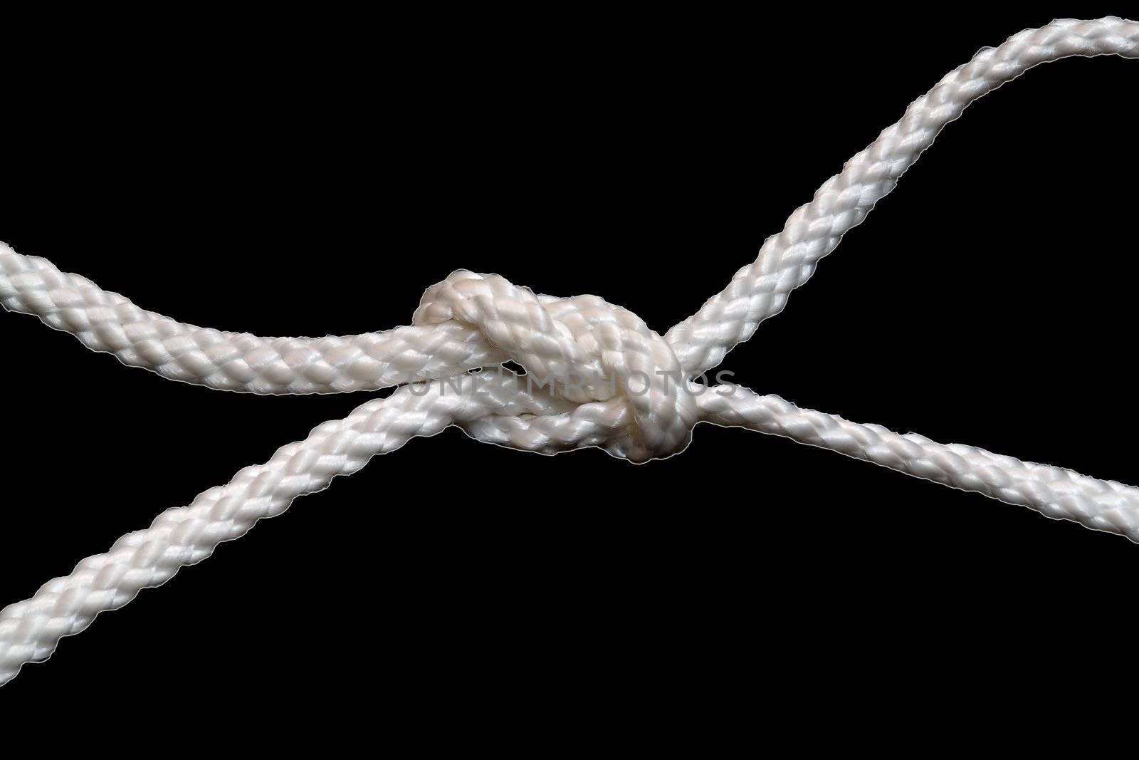 the cord is fastened by sea unit on a black background
