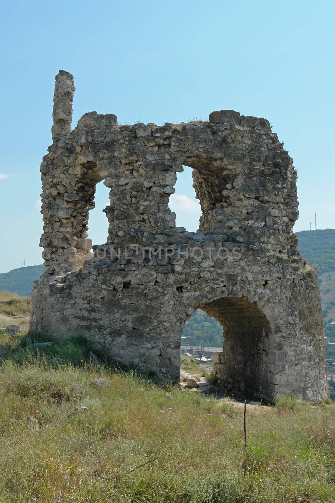 Ruins of an ancient fortress in mountain to Crimea                               
