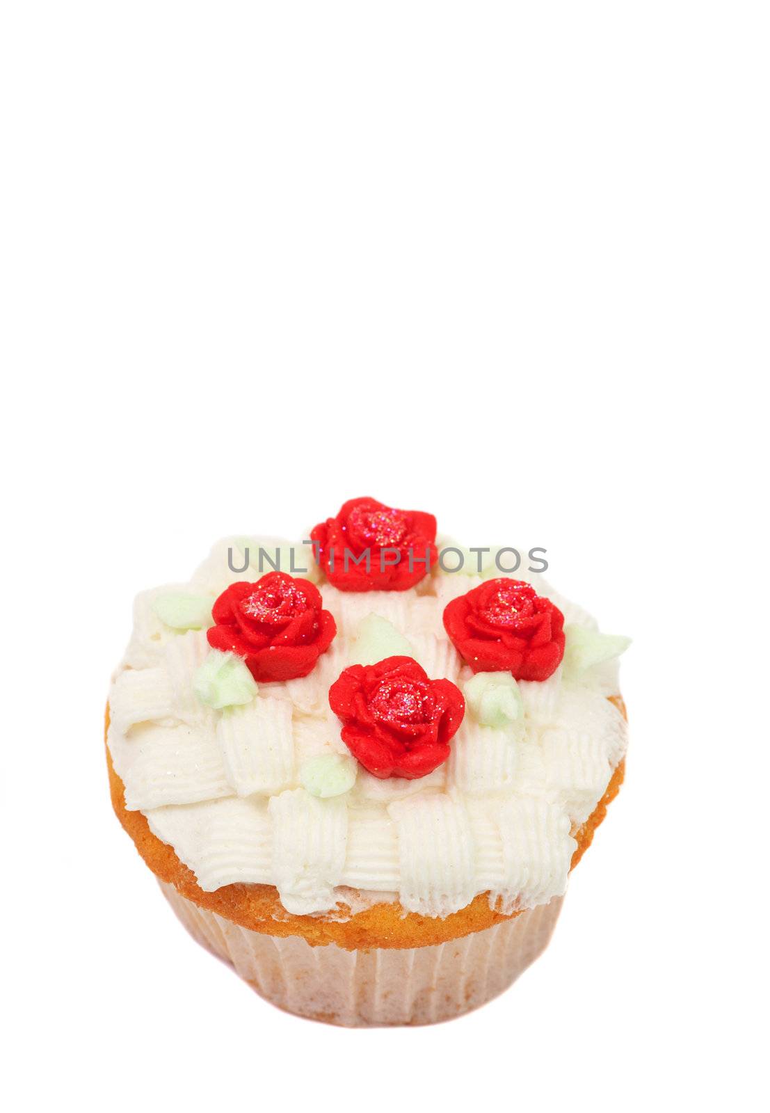 Fresh vanilla cupcake with basketweave buttercream icing and roses on white background