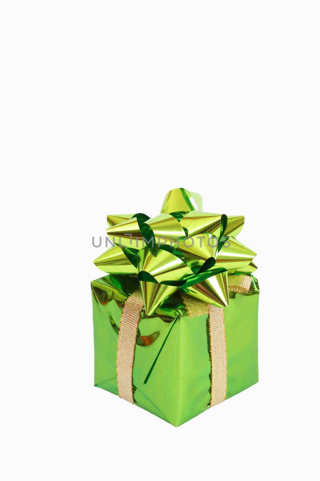 Green gift box with a bow for Christmas or Valentines Day isolated on white background with copy space