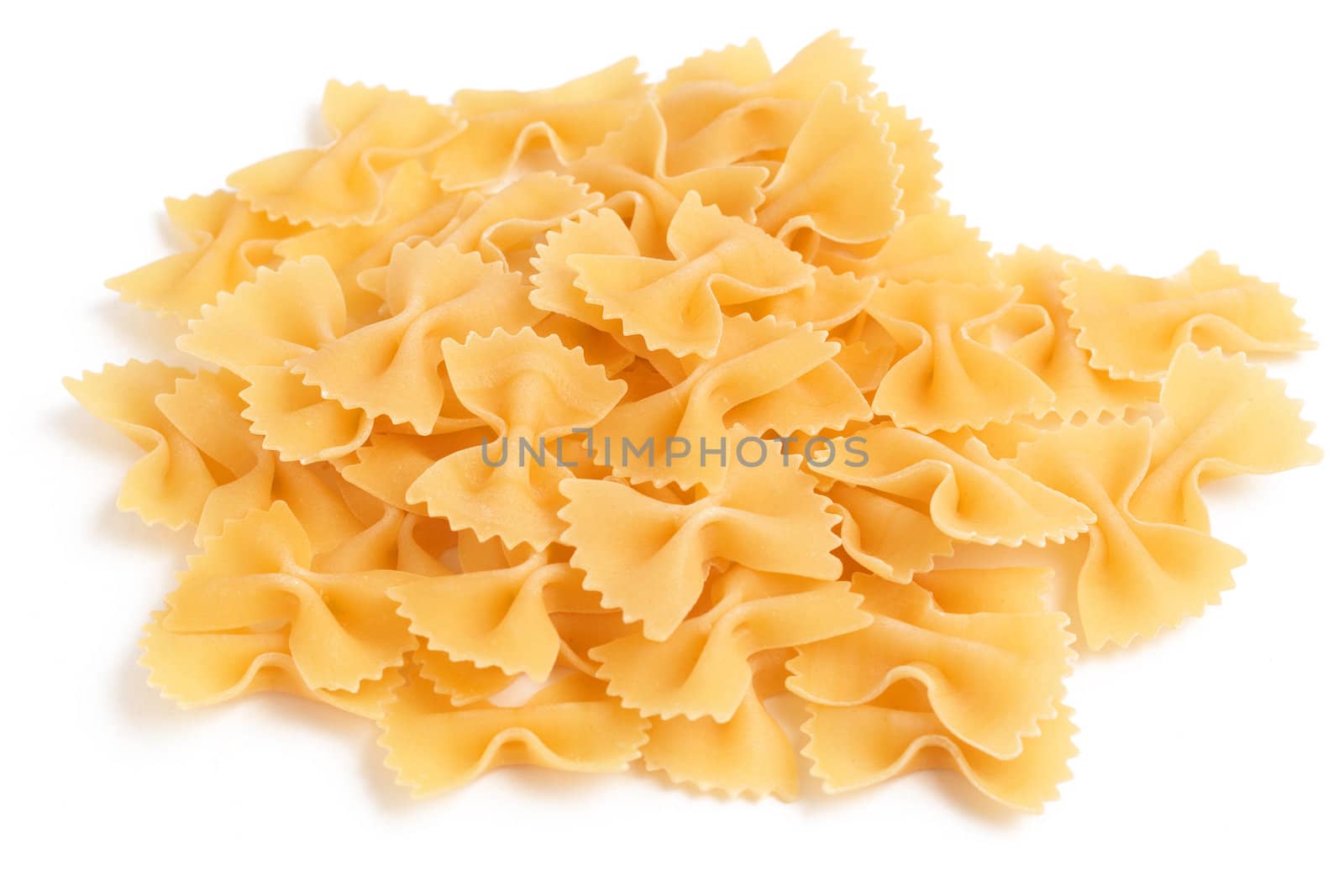 Closeup of Bow tie pasta Farfalloni isolated on white background