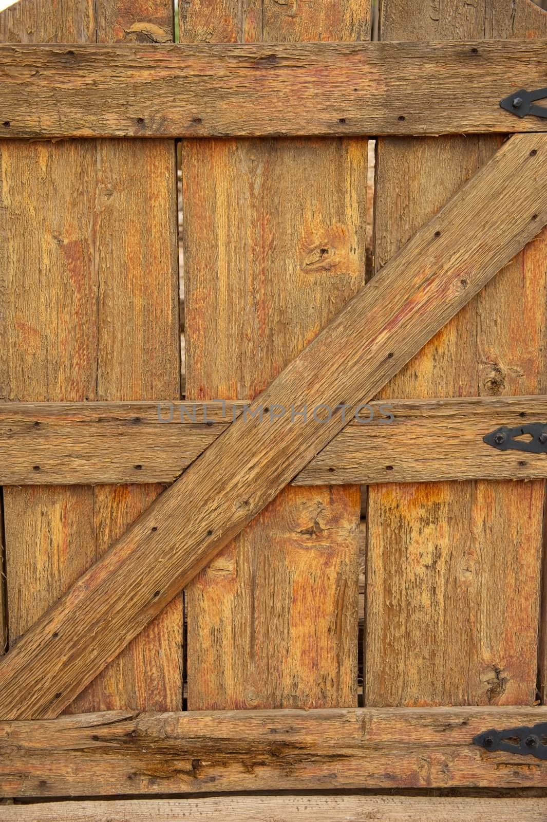 Old Wooden Gate with Black Hinges by pixelsnap