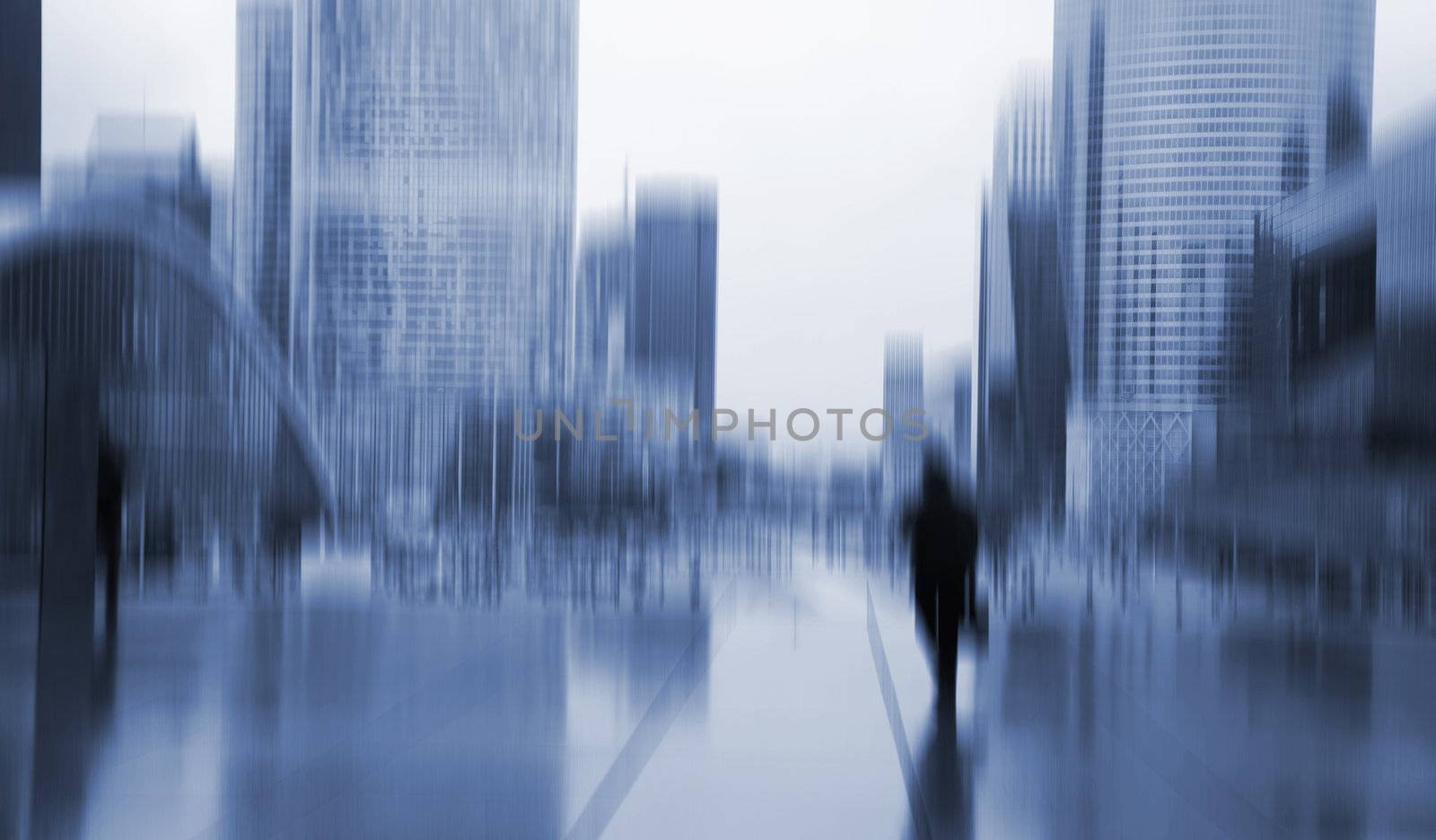 Stressed businessman on a rainy day in La Defense - Paris.