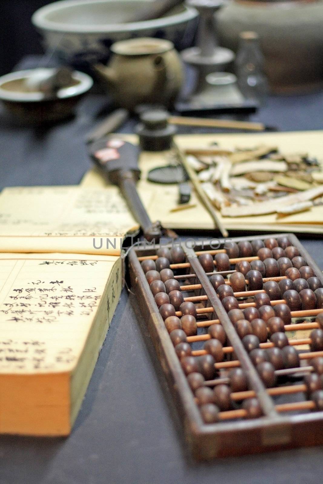 abacus and book on the table in a chinese old shop 
