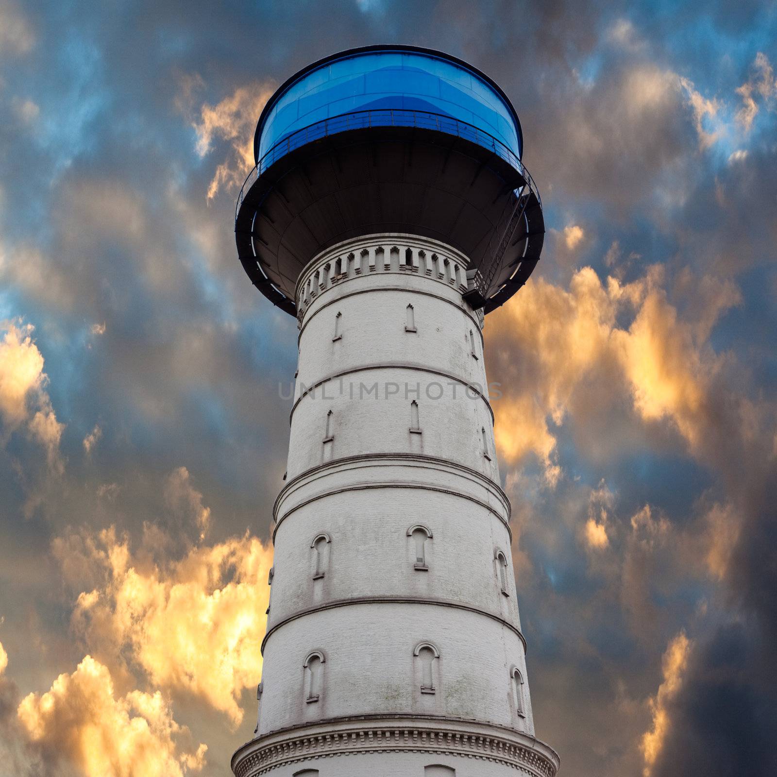 Historic water reservoir brick tower landmark still in use.