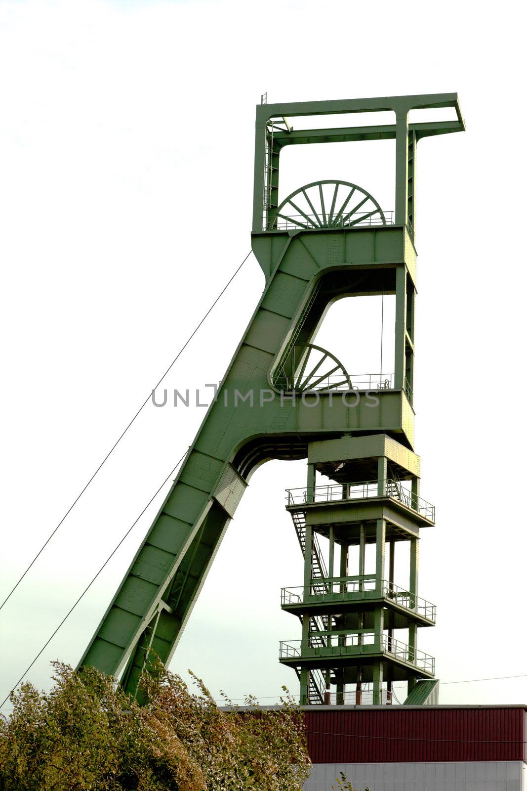 Headgear tower of underground coal mine shaft.