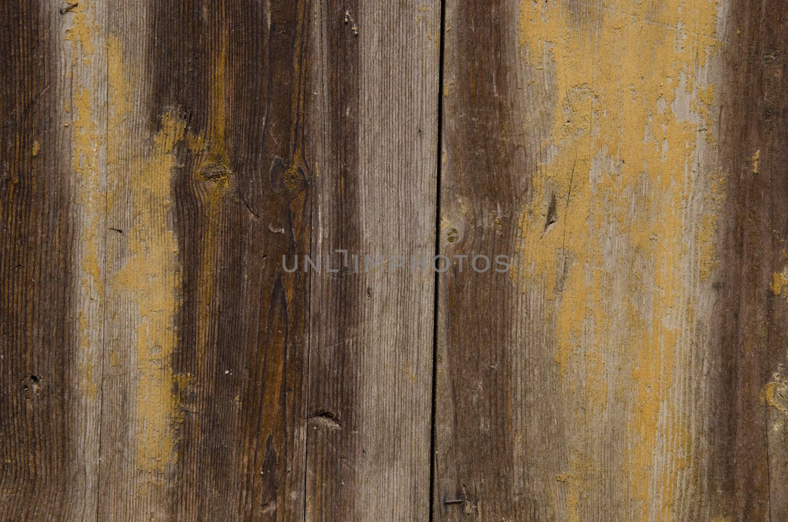 Old wooden wall fragment texture background. by sauletas