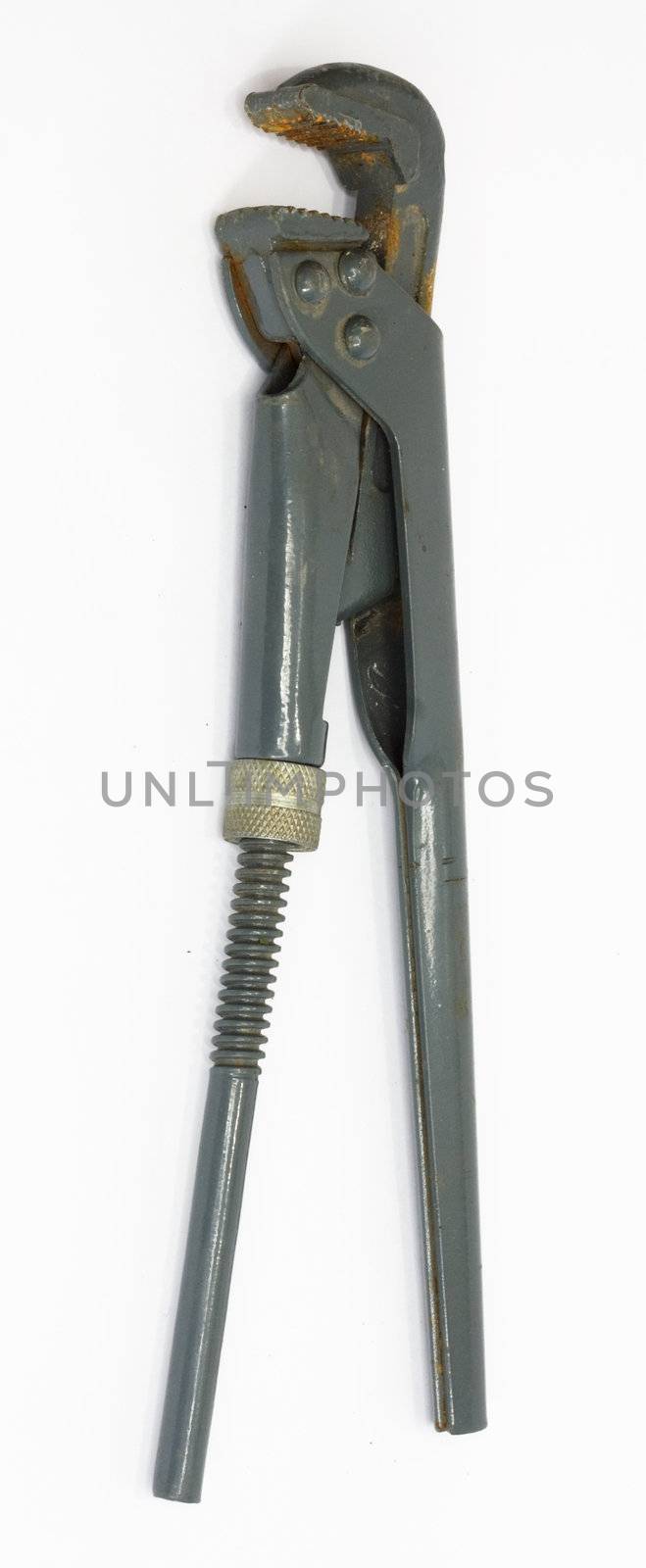 old adjustable spanner under the white background 