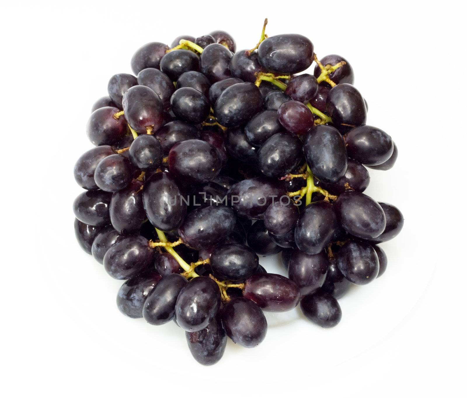 Bunch of black grapes isolated on white background  by schankz