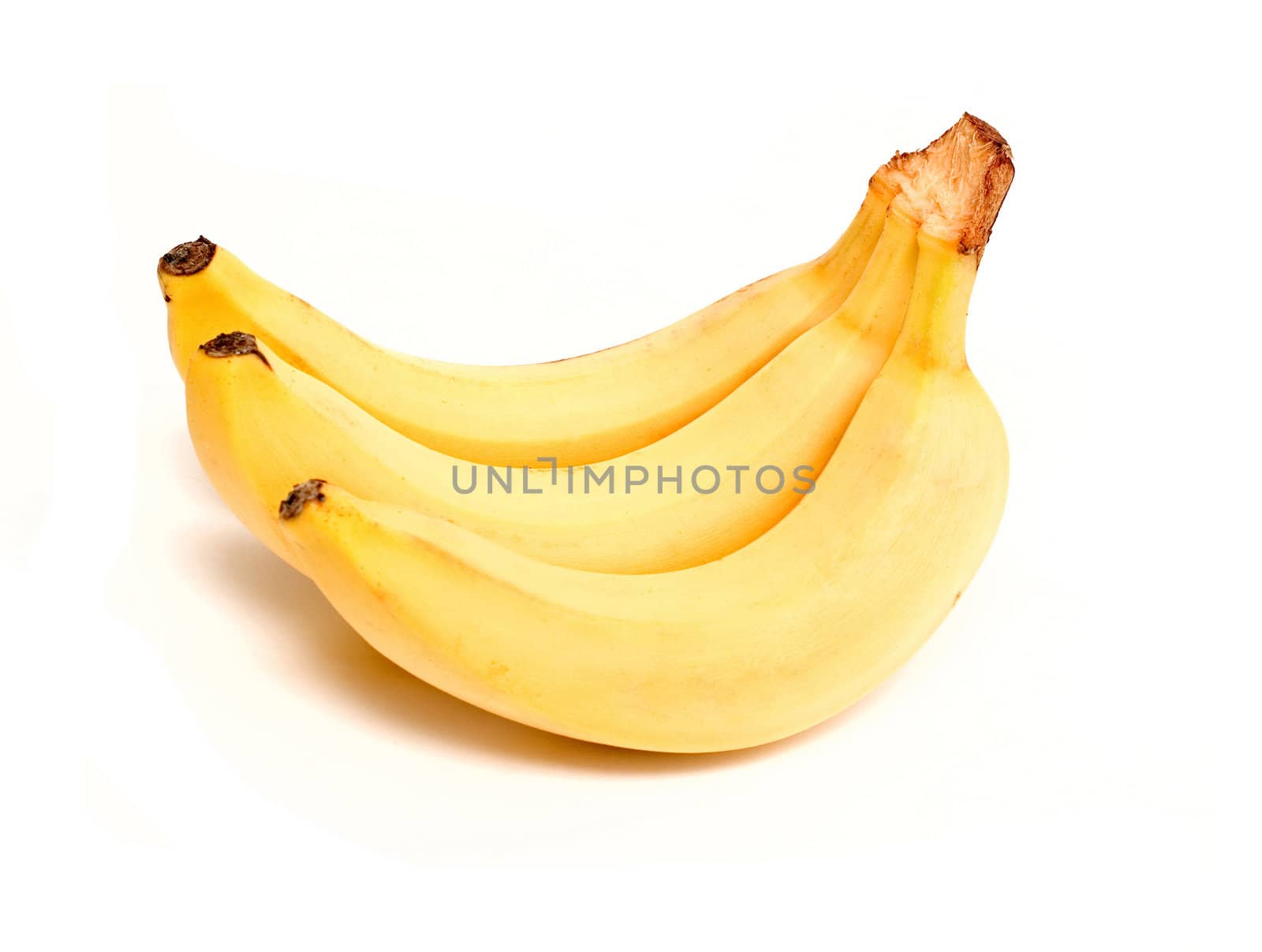 three mature bananas on white background