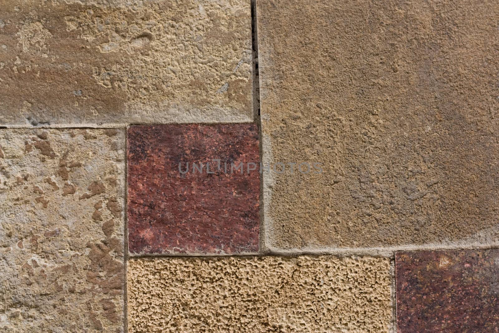 Unshaped stone wall pattern,wall made of rocks 