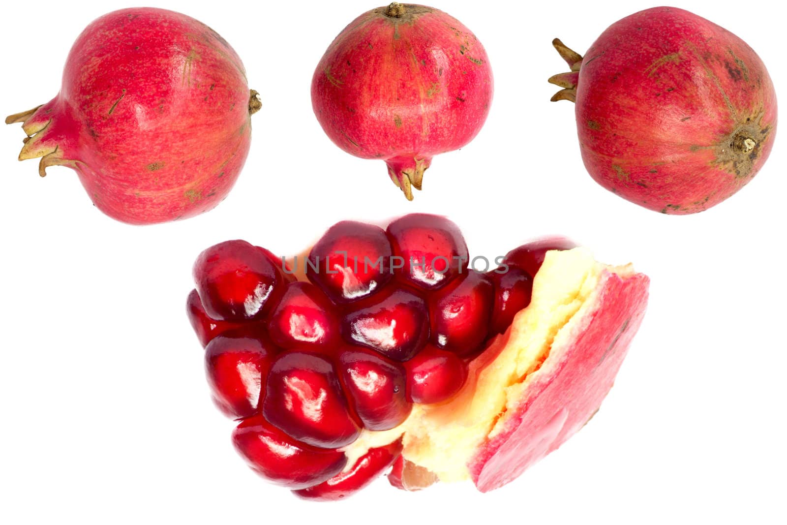 Extreme close up background of a red juicy ripe pomegranate fruit seeds 