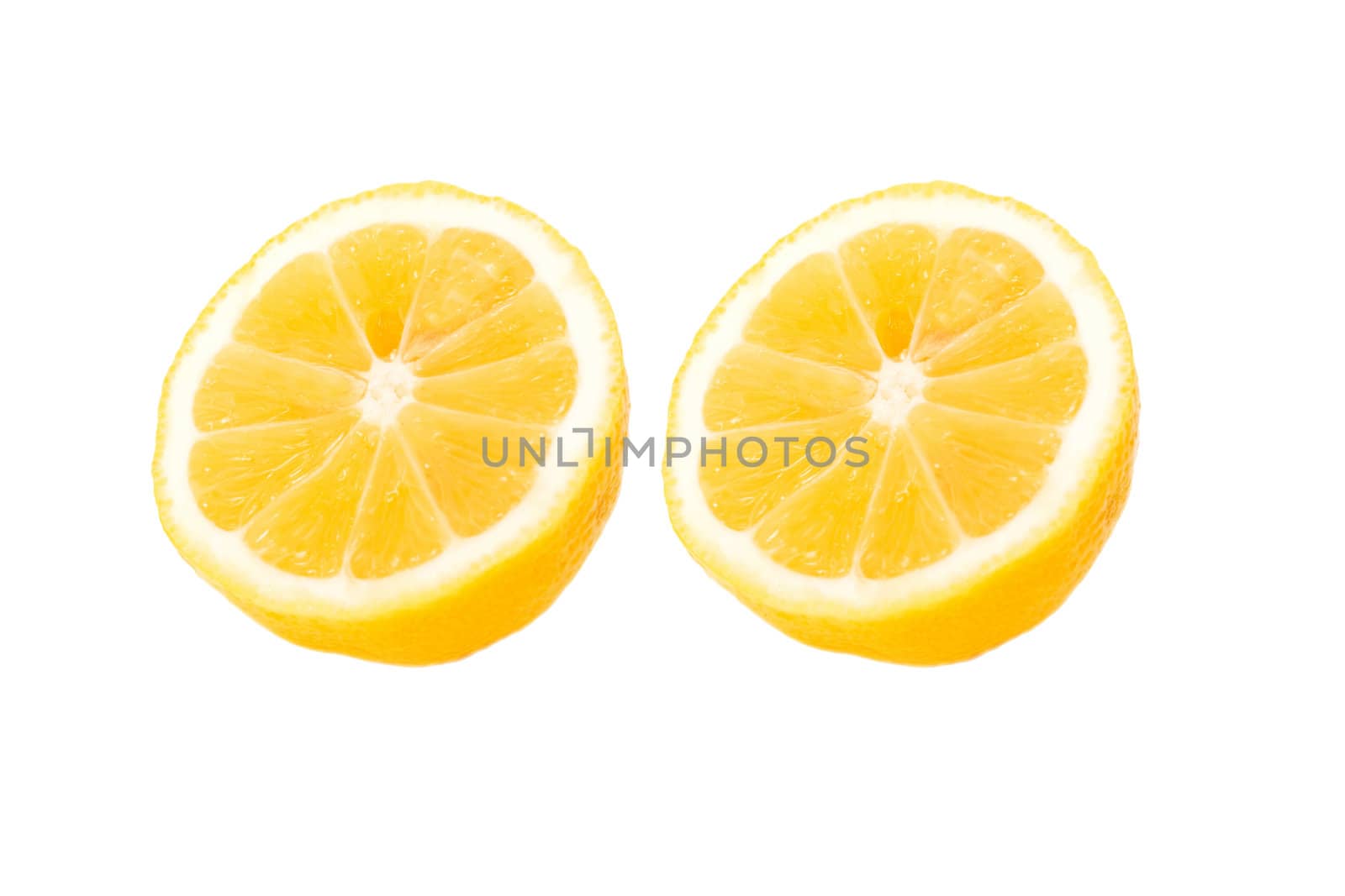 fresh lemon halves on white background
