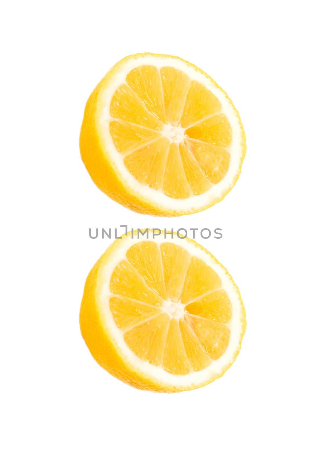 fresh lemon halves on white background
