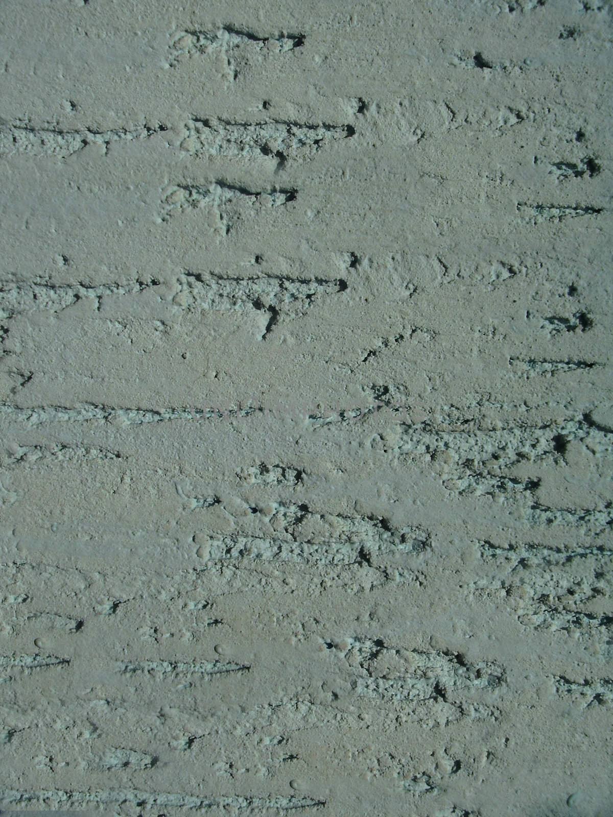 fragment of wall from grey concrete c rift
   