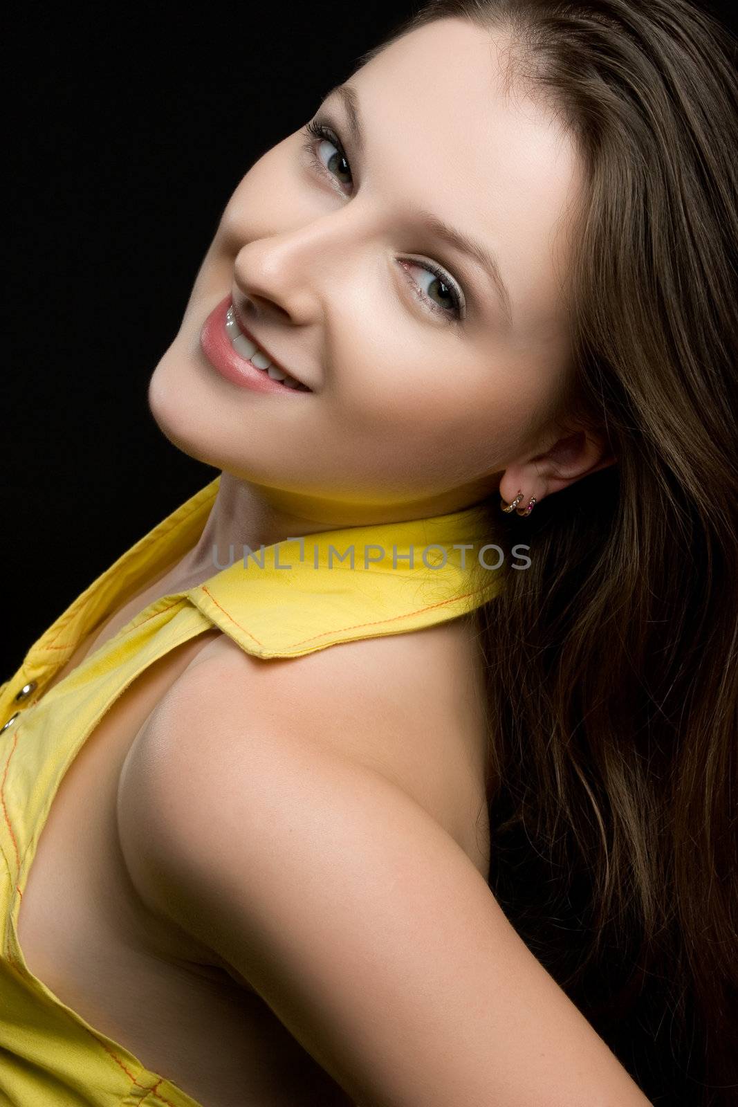Pretty cheerful young woman smiling