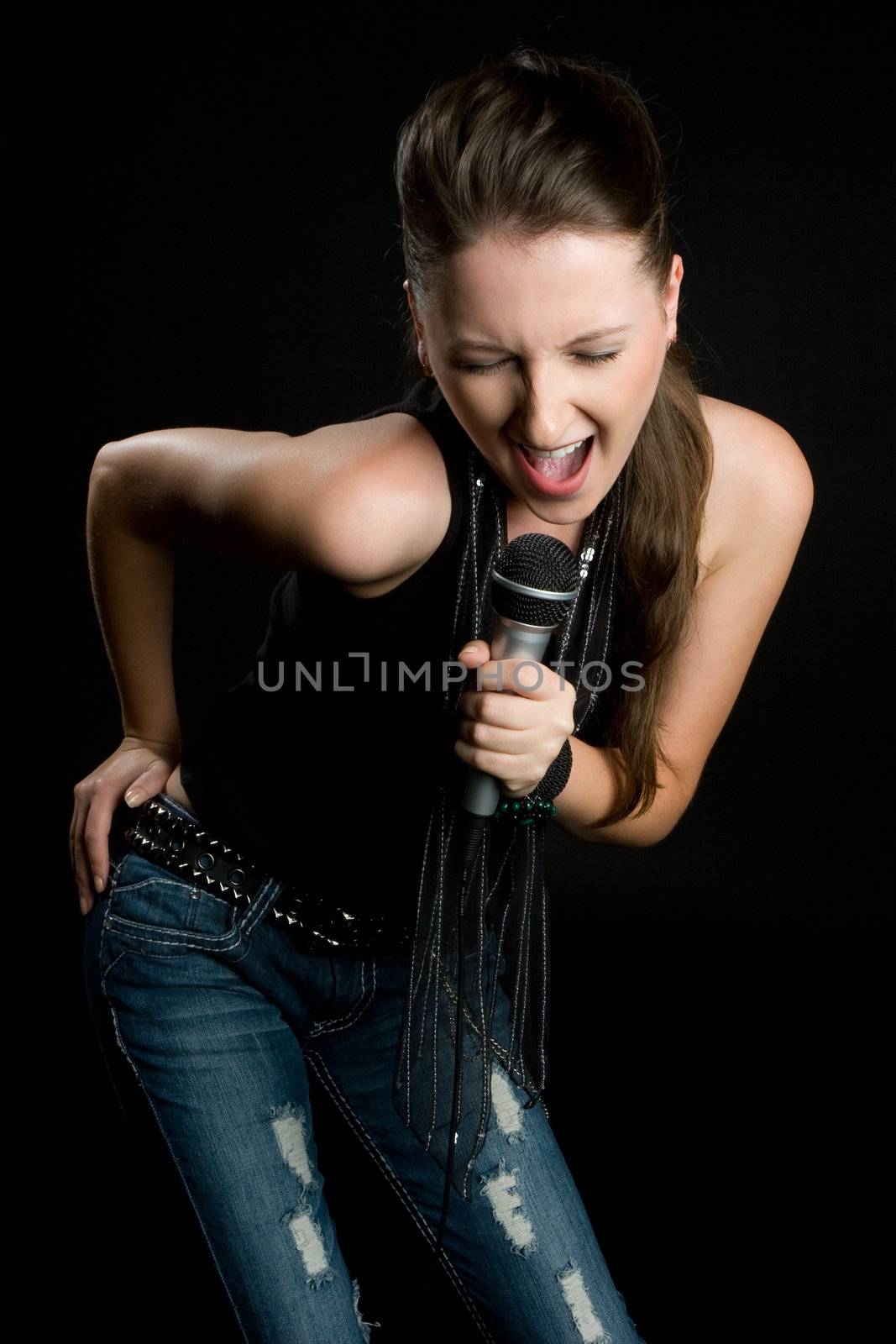 Beautiful woman singing microphone karaoke
