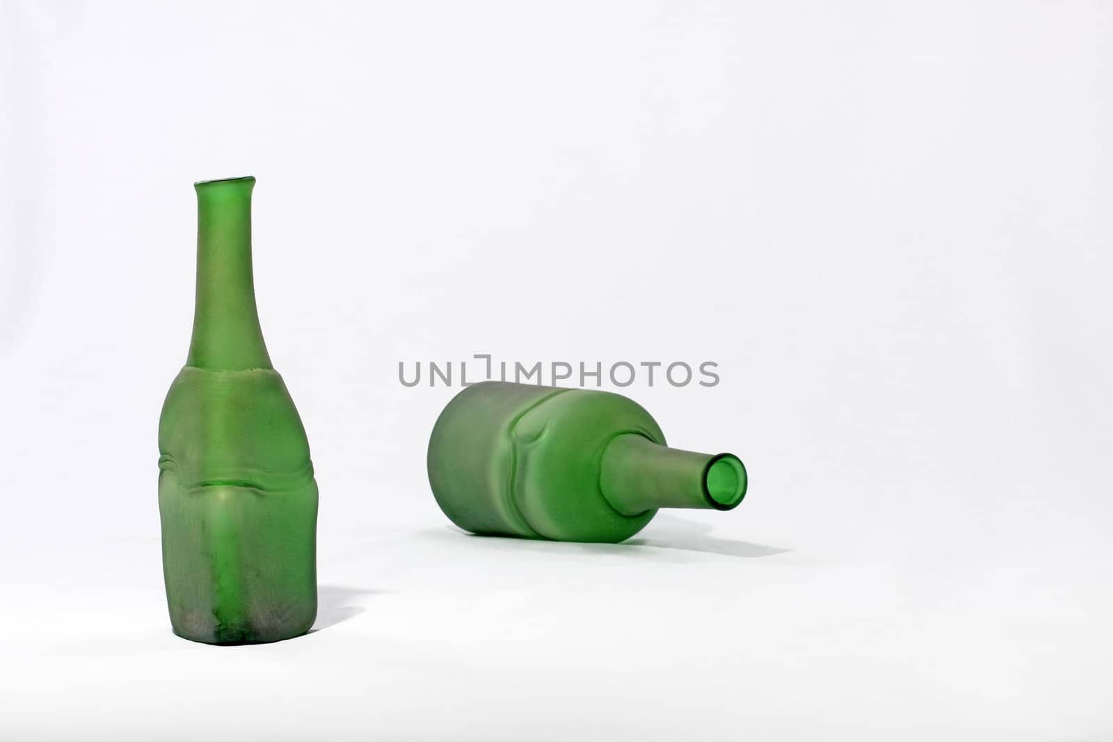 frosted bottle green on a white background