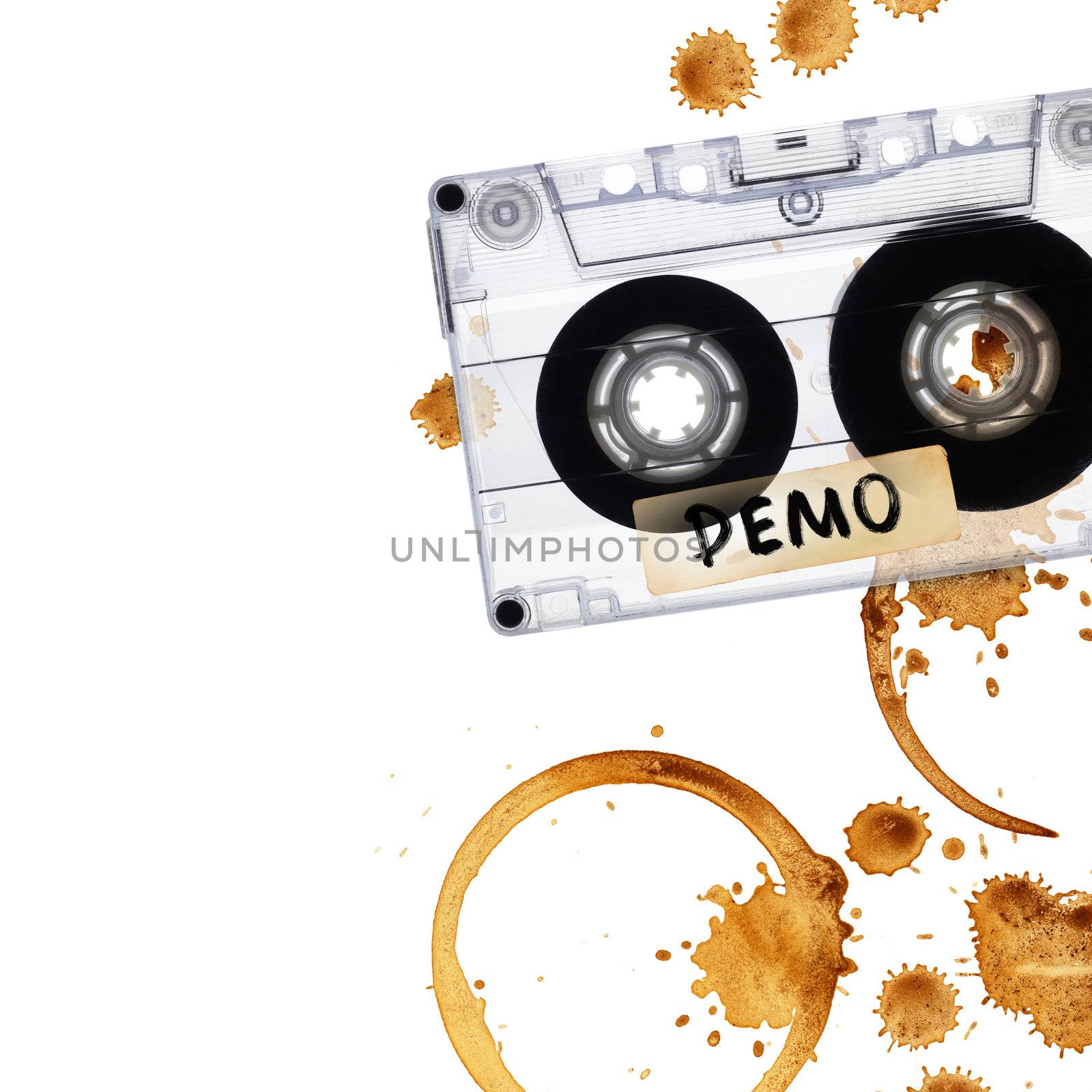 Vintage demo tape with coffee stains.  by pashabo