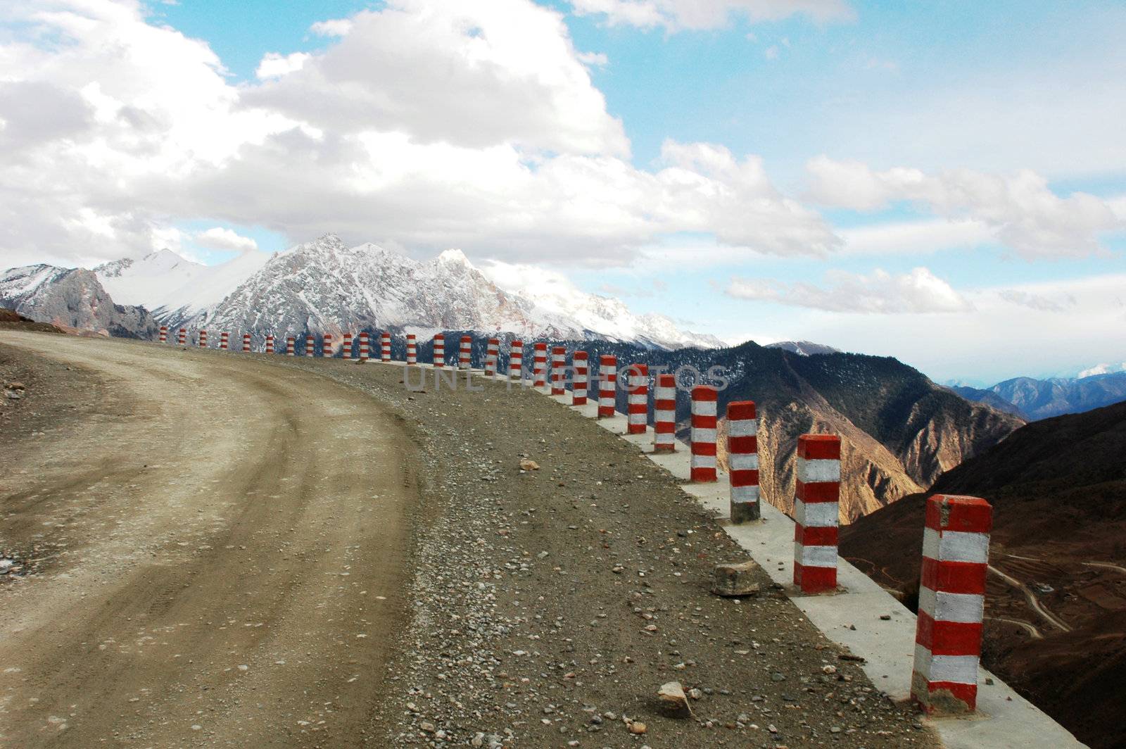 A rough mountain road in the highland of Tibet